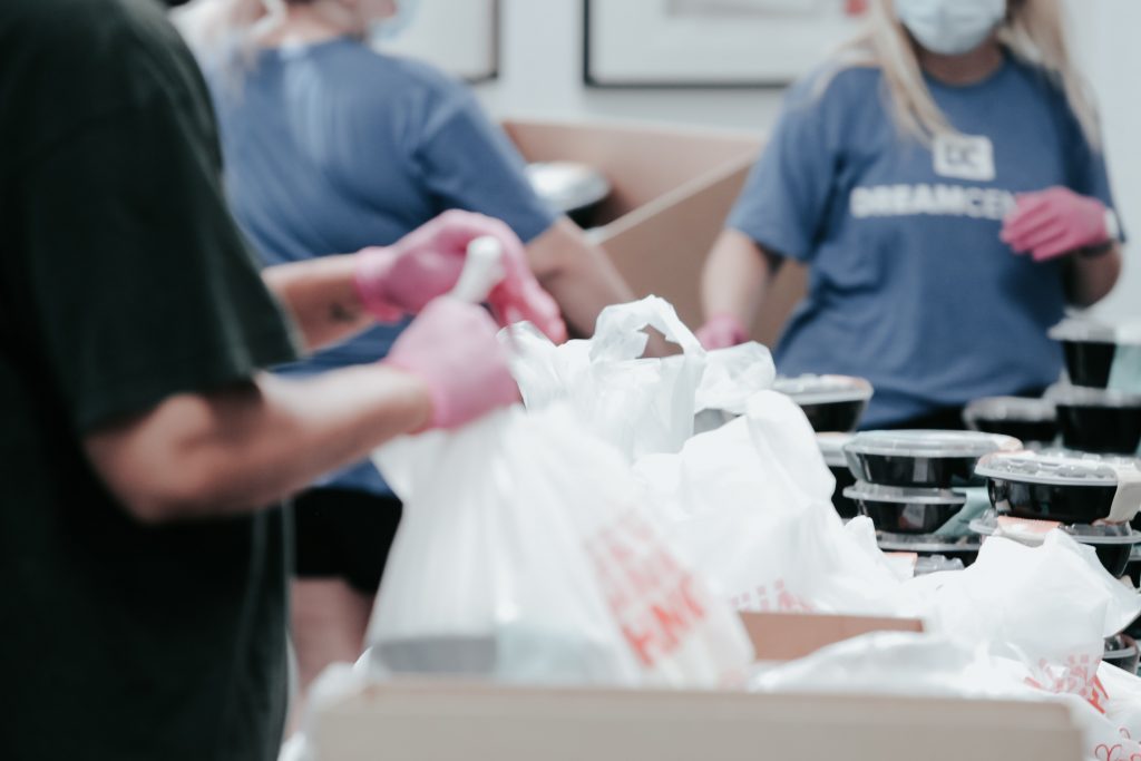 People making up food bags during the COVID-19 pandemic