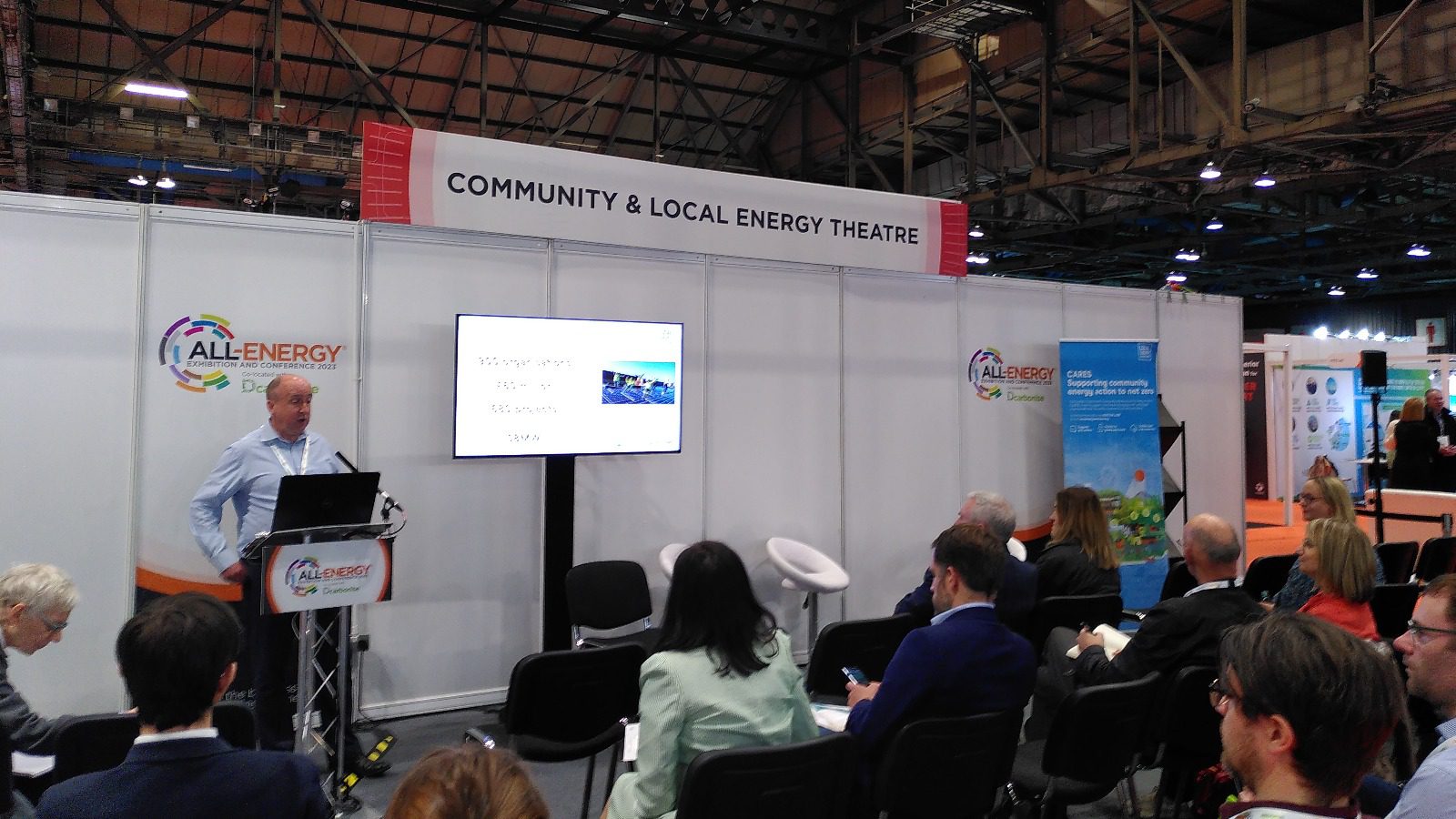 Chris Morris, Local Energy Scotland Manager, in the Community and Local Energy Theatre at All-Energy 2023.