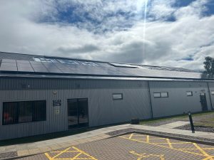Solar panels on top of the Strathdearn shop and cafe building