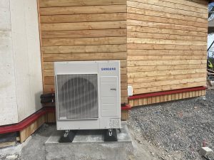 An air source heat pump outside Murtle Market.